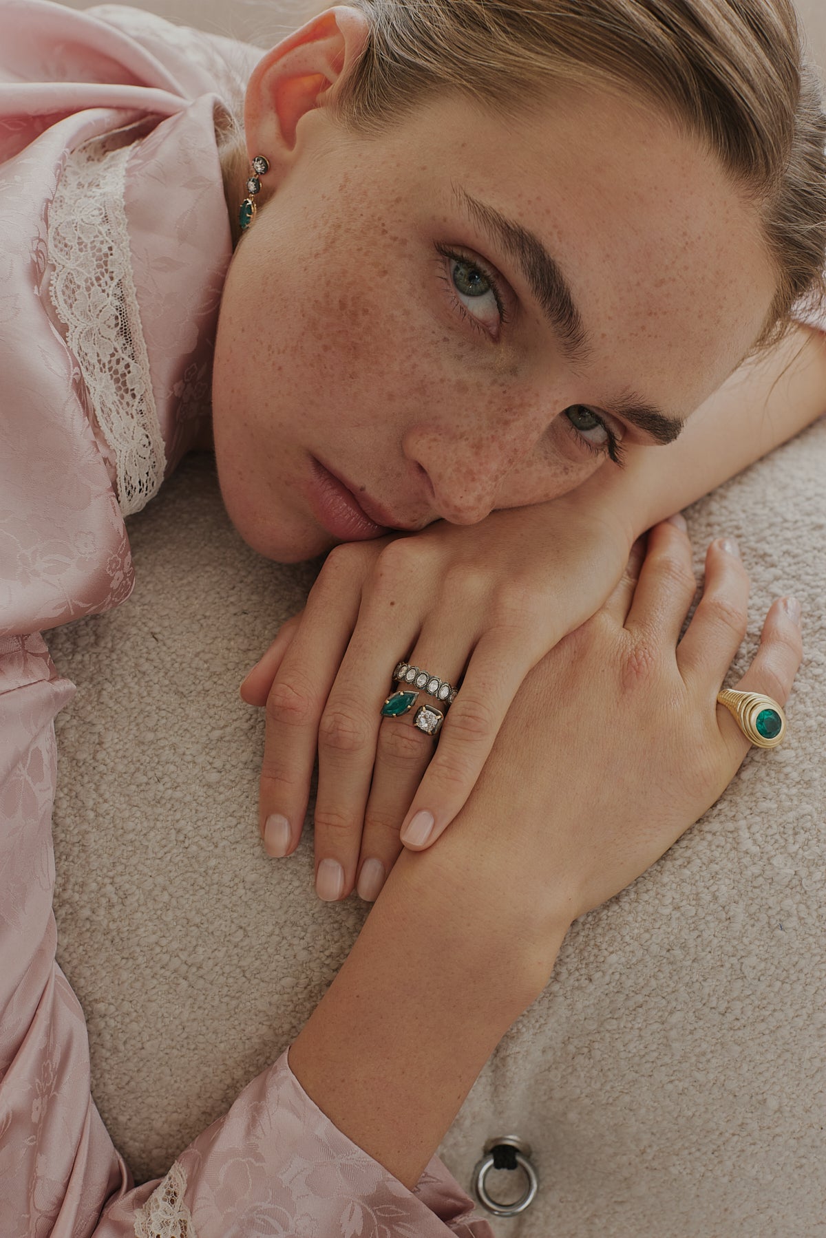 Emerald and cushion diamond ring