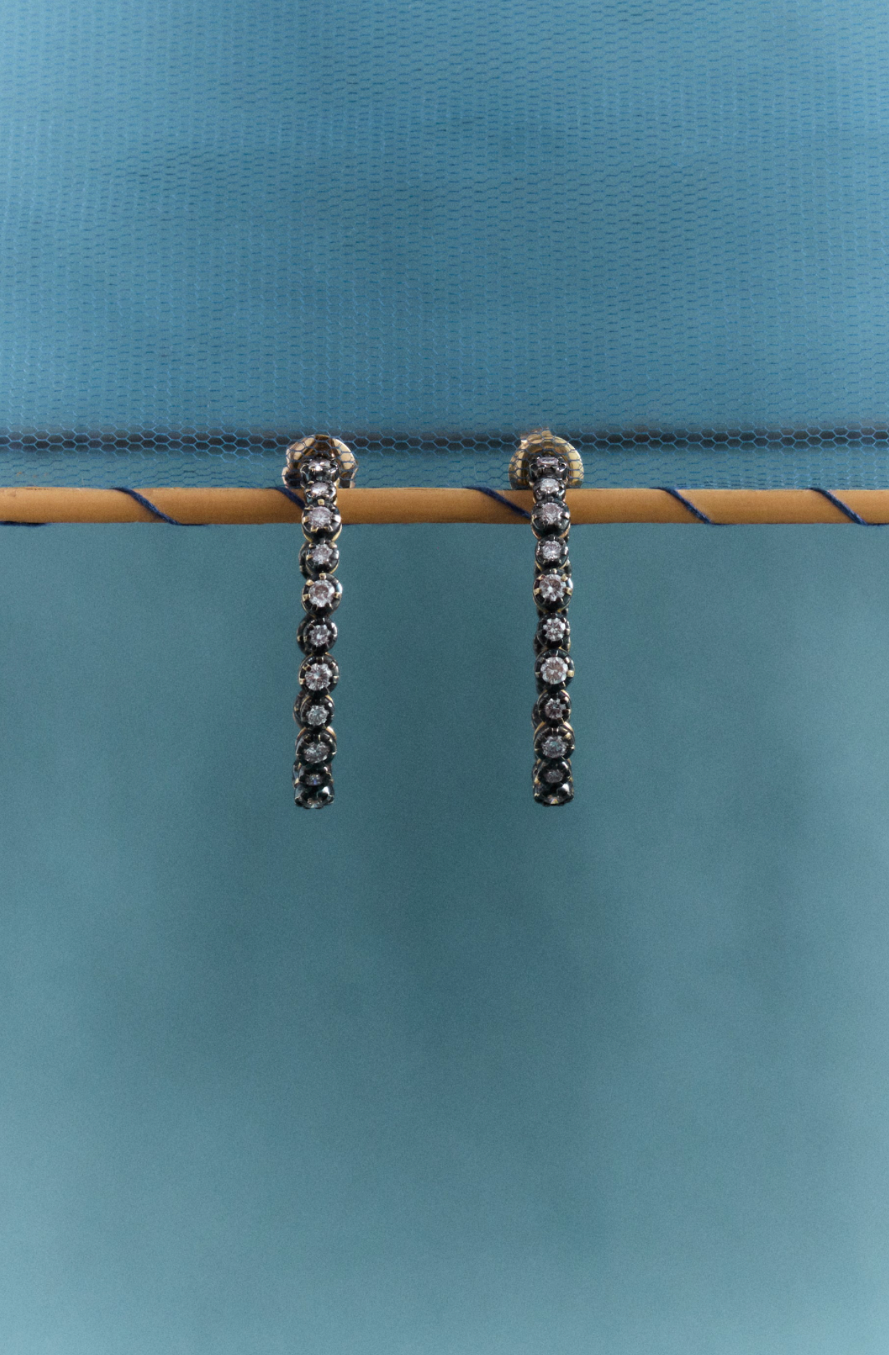 Midnight oval hoop earrings