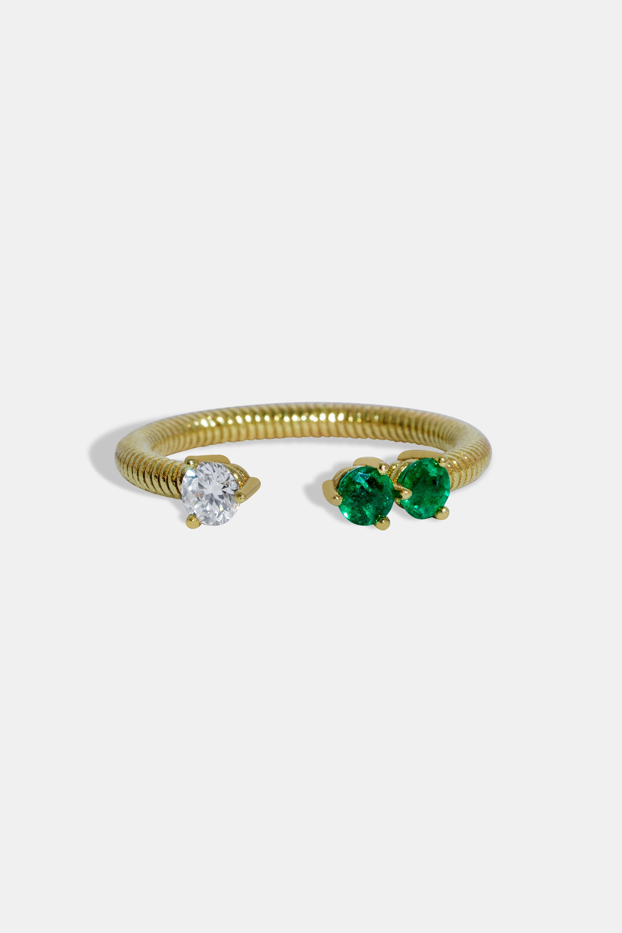 Cabo open ring with diamond & emeralds