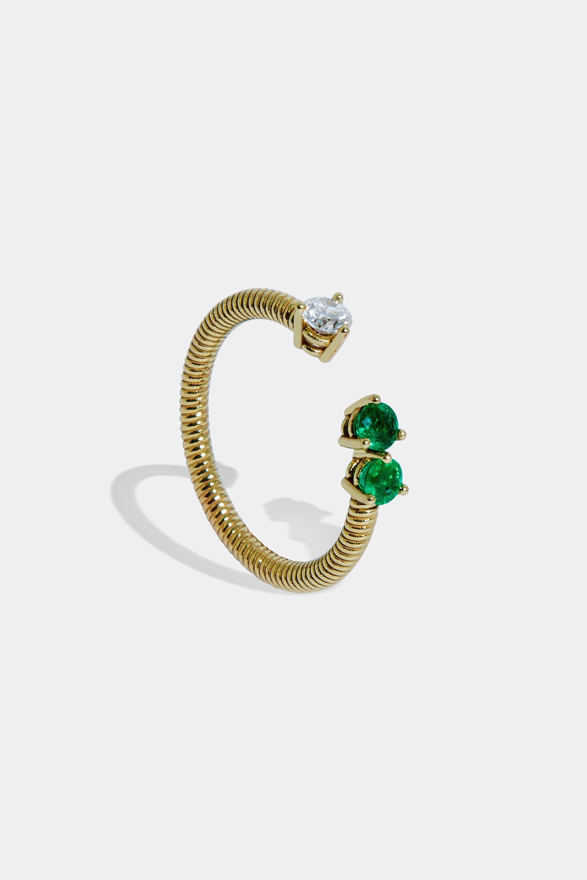 Cabo open ring with diamond & emeralds