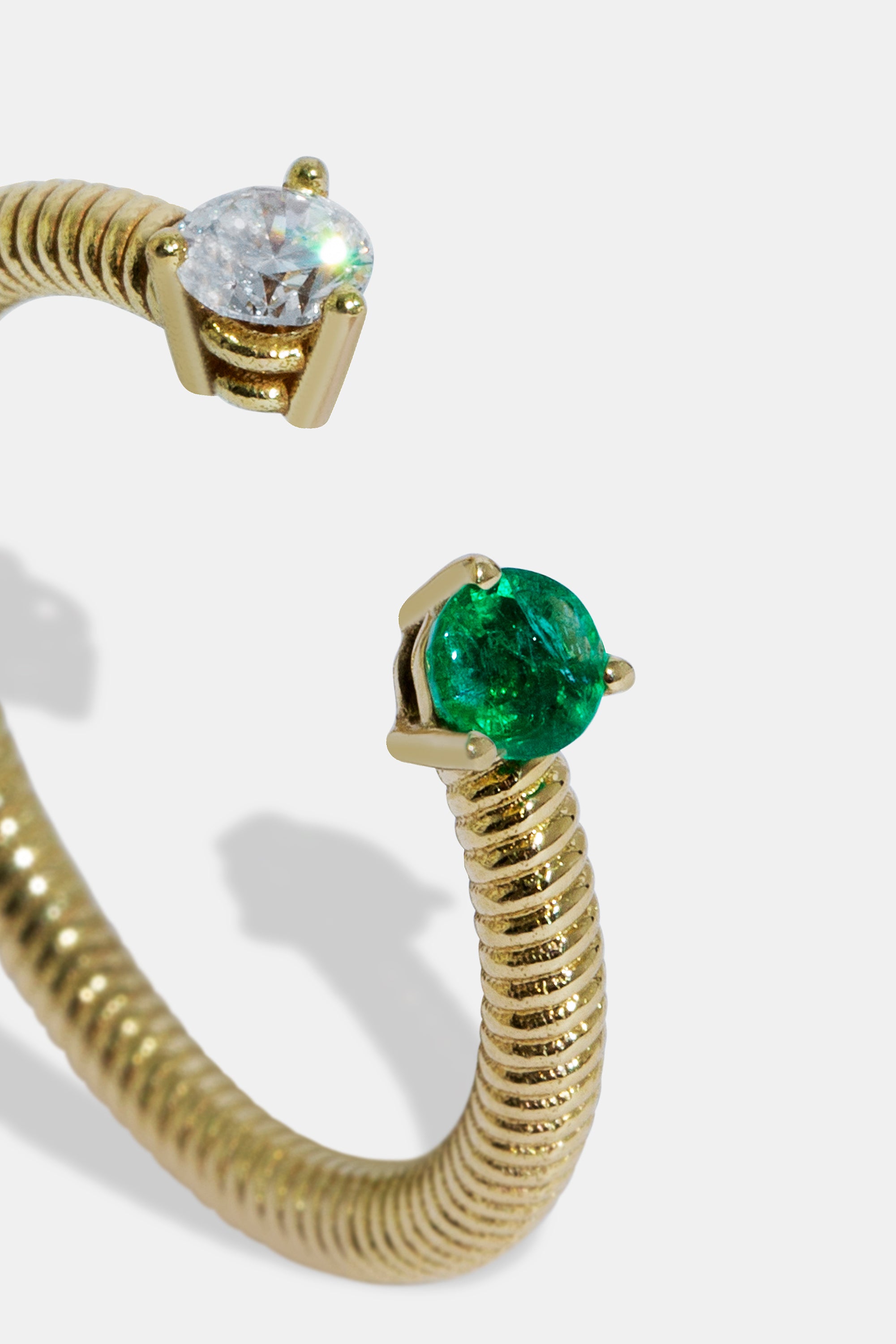 Cabo open ring diamond & emerald
