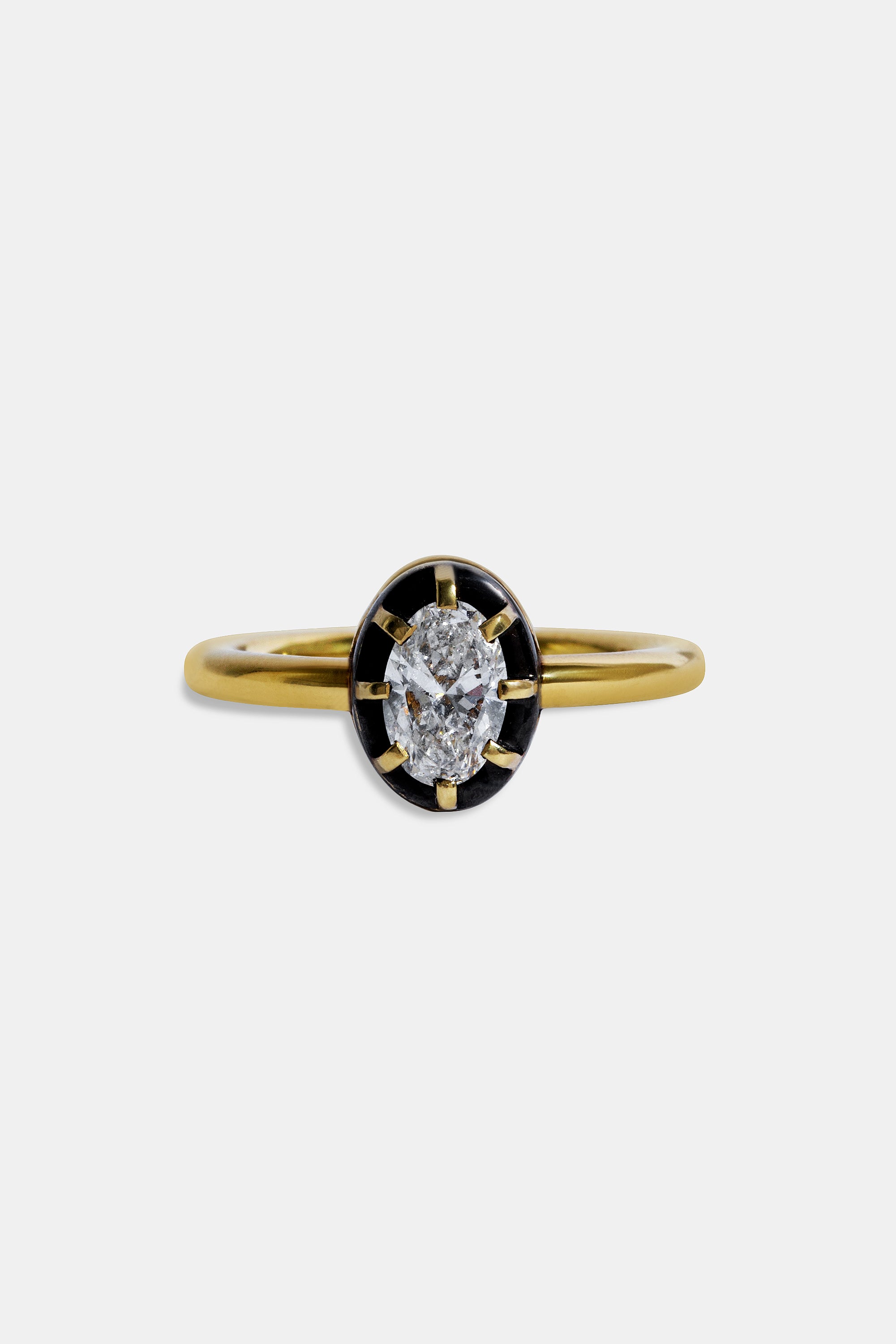Midnight solitaire oval ring 0.58ct.