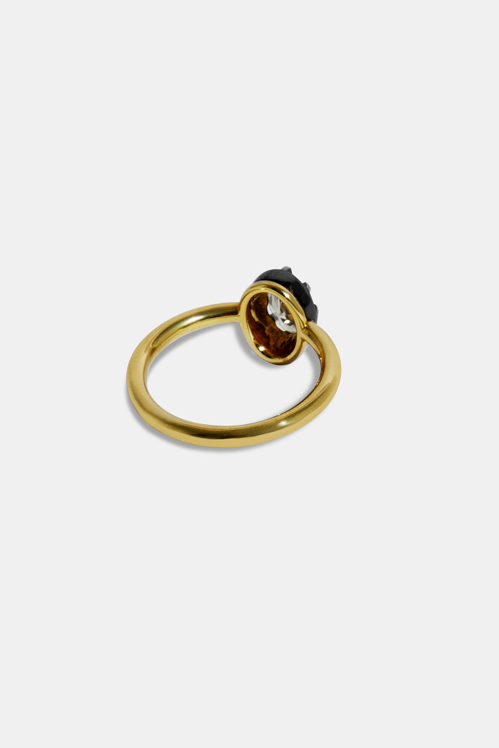 Midnight solitaire oval ring 0.58ct.