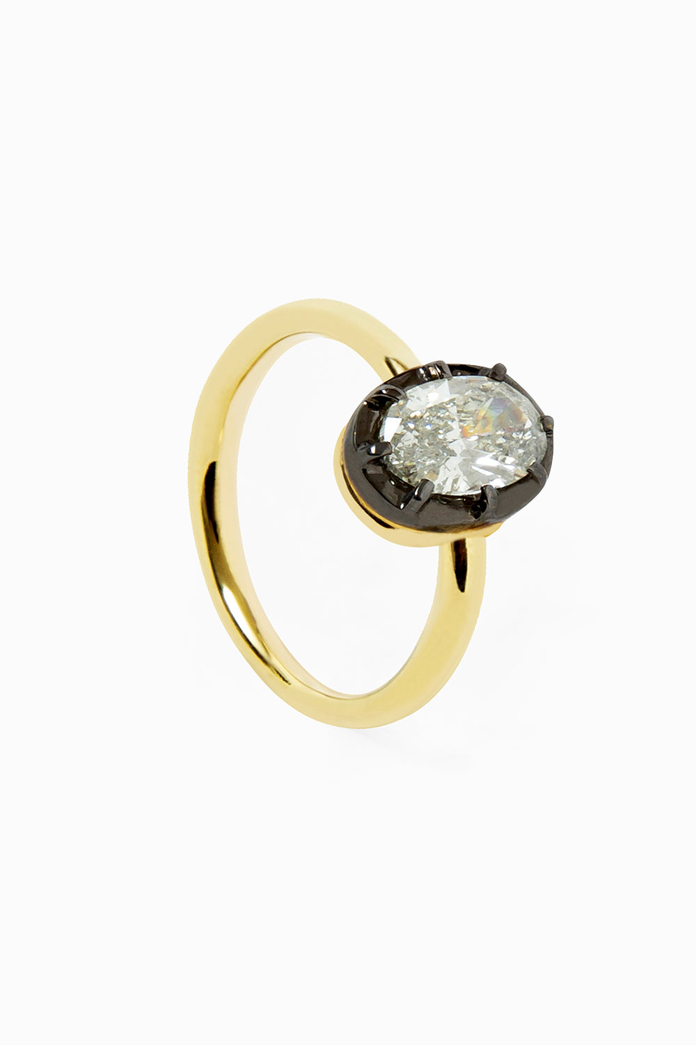 Black rhodium ring with oval diamond